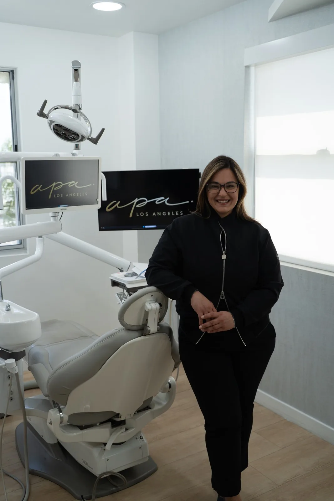Dr. Andi-Jean Miro in a treatment room at Apa Aesthetic Los Angeles